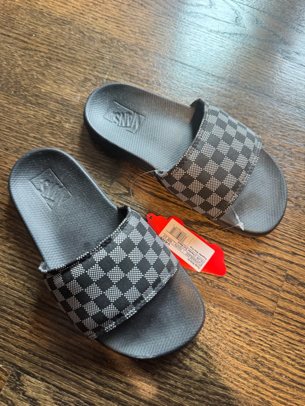 Vans Kids' Checkerboard Slide Sandals in Black size 2